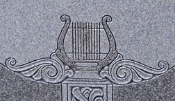 Harp on gravestone